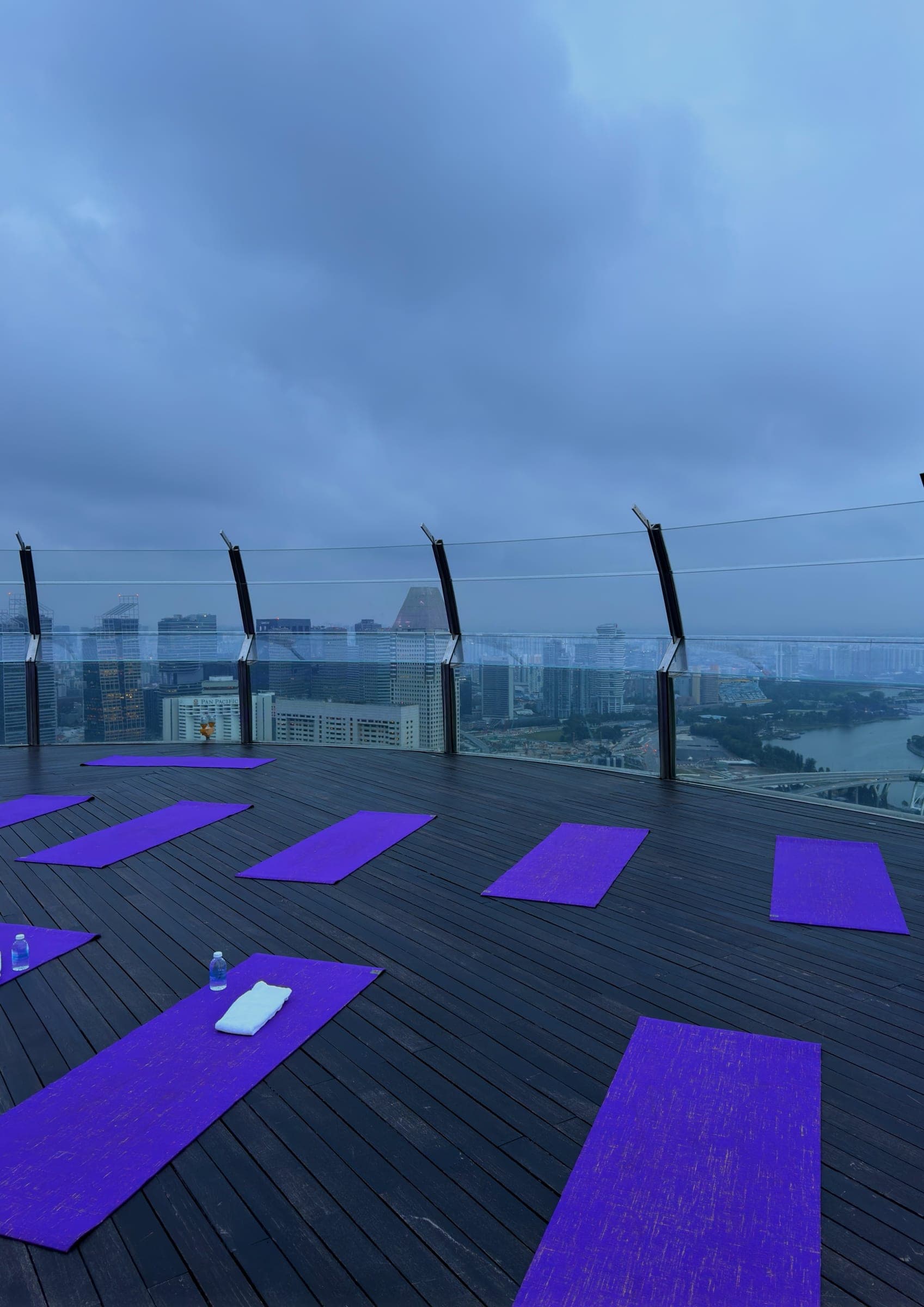 Yoga mats laid across the SkyPark deck at first light