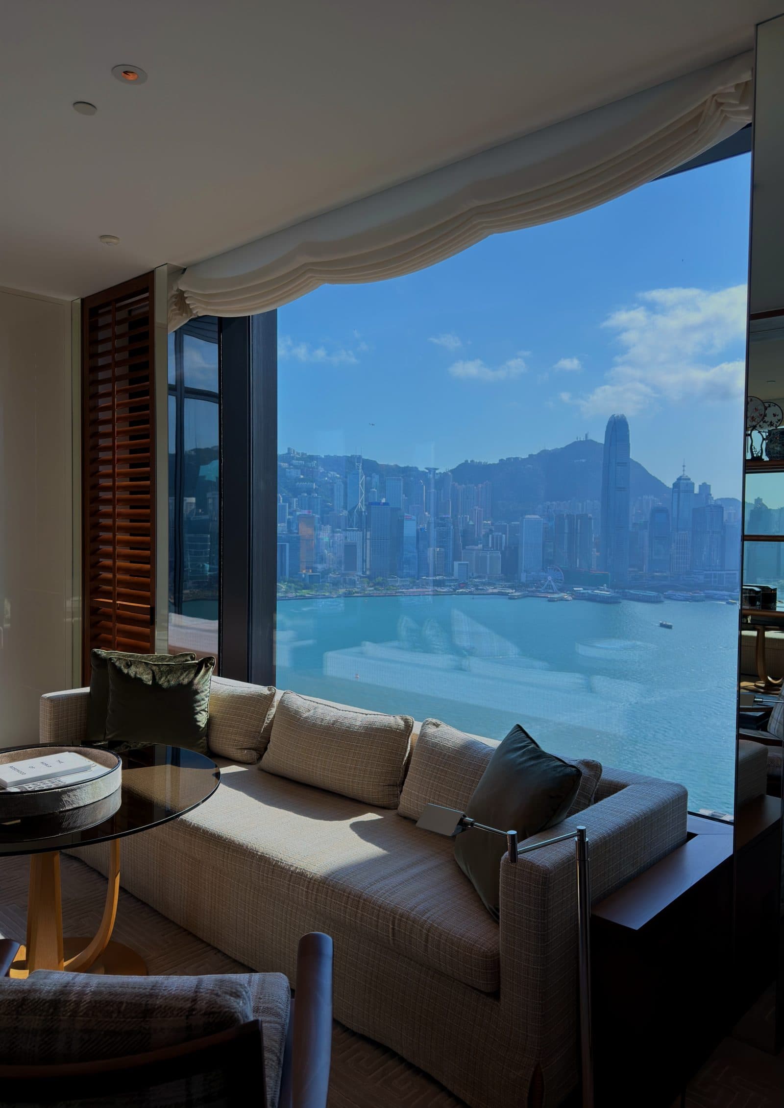 A suite living room opening to Victoria Harbour