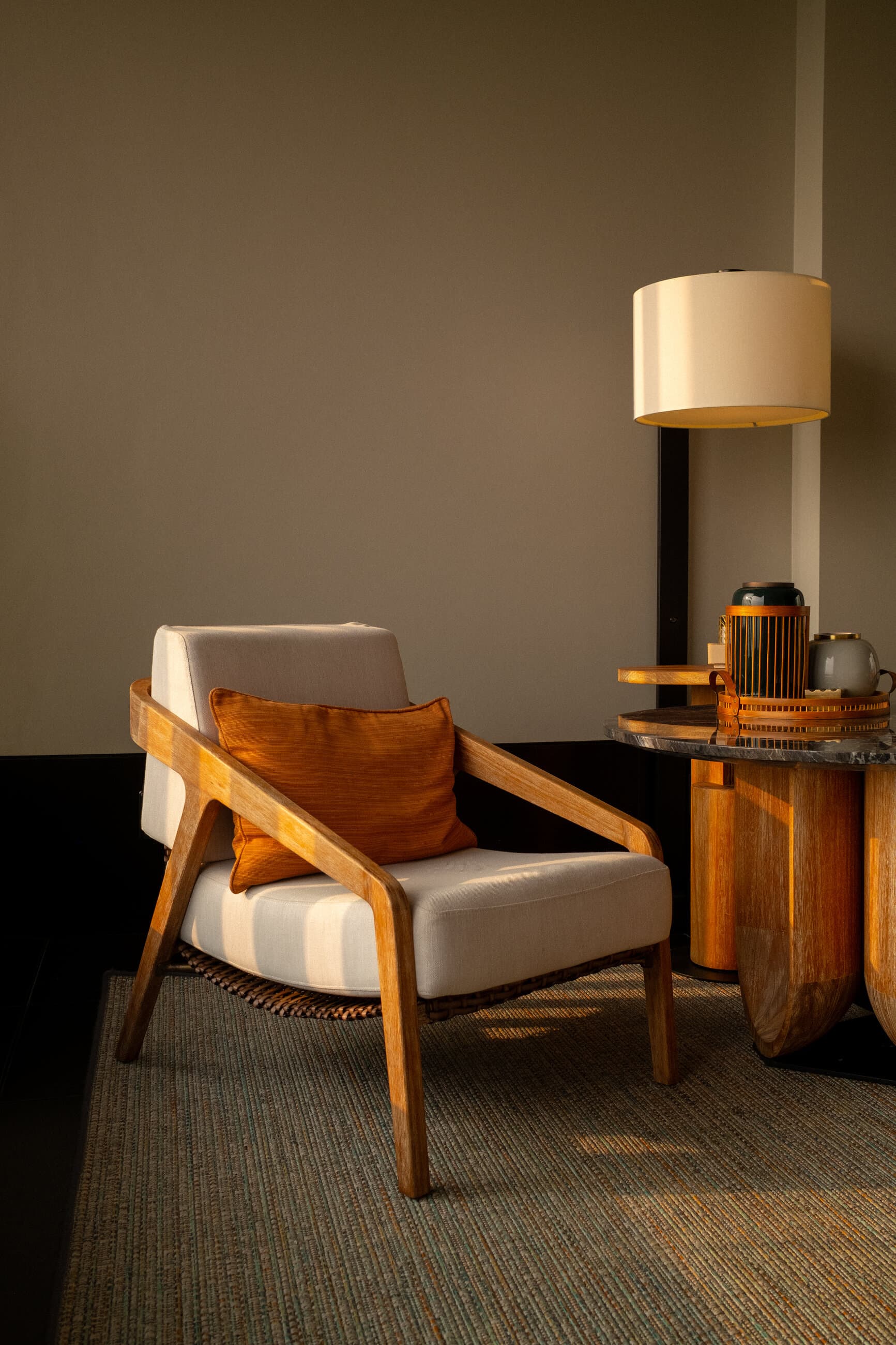 An armchair in late golden light, photographed by Carter Beau Studio